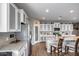 Bright kitchen with granite countertops, stainless steel appliances, and pantry at 3515 N Brooklyn Dr, Buckeye, AZ 85396