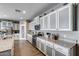 Modern kitchen featuring granite countertops, stainless steel appliances, and ample cabinet space at 3515 N Brooklyn Dr, Buckeye, AZ 85396