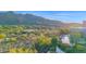 Beautiful home nestled in the desert landscape, featuring a pool and stunning mountain views at 37221 N Holiday Ln, Carefree, AZ 85377