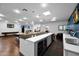 Bright game room with a wet bar, a pool table, and plenty of space for entertaining guests at 37221 N Holiday Ln, Carefree, AZ 85377