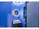 Stylish powder room featuring a modern vanity, vessel sink, and illuminated round mirror at 37221 N Holiday Ln, Carefree, AZ 85377