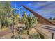 Unique landmark featuring the Carefree Sundial, desert landscaping, and Christmas tree in the background at 37221 N Holiday Ln, Carefree, AZ 85377