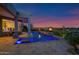 Beautiful home with a pool, fire bowls, and desert views, perfect for relaxation at 37221 N Holiday Ln, Carefree, AZ 85377
