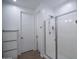Bright bathroom featuring a walk-in shower with glass enclosure, and neutral wall at 3911 S 78Th Ln, Phoenix, AZ 85043