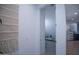 Bright Bedroom with white trim, soft carpet, and a view into the hallway at 3911 S 78Th Ln, Phoenix, AZ 85043