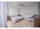 Bright main bedroom with light-colored walls, carpet and large bed at 3911 S 78Th Ln, Phoenix, AZ 85043