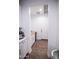 Well-lit mud room with butcher block countertop, cabinets, and tile flooring at 3911 S 78Th Ln, Phoenix, AZ 85043