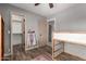 Bright bedroom with closet and doorway access, plus a bunk bed frame at 4117 W Whispering Wind Dr, Glendale, AZ 85310