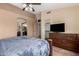 Spacious main bedroom leading to ensuite bathroom and closet at 4117 W Whispering Wind Dr, Glendale, AZ 85310