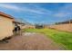 Backyard featuring a patio and green lawn space at 4160 W Granada Rd, Phoenix, AZ 85009