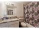 Bathroom features include decorative shower curtain and granite vanity at 4160 W Granada Rd, Phoenix, AZ 85009