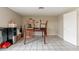 A spacious dining area with tiled floors, ready for Gathering meals and entertaining at 4160 W Granada Rd, Phoenix, AZ 85009