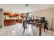 Open floorplan of dining area and kitchen shows open concept living at 4160 W Granada Rd, Phoenix, AZ 85009
