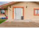 Inviting front entryway, featuring security door and neat landscaping at 4160 W Granada Rd, Phoenix, AZ 85009