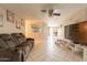 Large living room with tile floors, neutral walls, and modern decor at 4160 W Granada Rd, Phoenix, AZ 85009