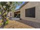 Backyard with a covered patio and a manicured desert landscape at 4293 E Sourwood Dr, Gilbert, AZ 85298