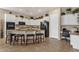Spacious kitchen with a breakfast bar, island, stainless steel appliances and ample cabinet space at 4293 E Sourwood Dr, Gilbert, AZ 85298