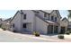 Charming townhouse with a two-car garage, desert landscaping, and a welcoming front entrance at 475 S Seawynds Blvd, Gilbert, AZ 85233