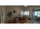 Inviting living room with stylish decor, plantation shutters, and comfortable seating creating an airy atmosphere at 475 S Seawynds Blvd, Gilbert, AZ 85233