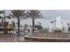 Scenic view of a community water feature with palm trees and water at 475 S Seawynds Blvd, Gilbert, AZ 85233