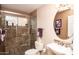 Nicely remodeled bathroom with a glass shower enclosure, modern fixtures, and stylish tile work at 4970 S Desert Willow Dr, Gold Canyon, AZ 85118