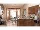 Bright kitchen nook featuring bay windows and natural light adjacent to the kitchen at 4970 S Desert Willow Dr, Gold Canyon, AZ 85118
