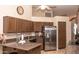 Well-appointed kitchen featuring stainless steel appliances, granite countertops, and ample cabinet space at 4970 S Desert Willow Dr, Gold Canyon, AZ 85118