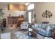 Inviting living room with vaulted ceilings, neutral tones, and stylish furnishings, creating a relaxing atmosphere at 4970 S Desert Willow Dr, Gold Canyon, AZ 85118
