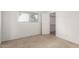 Neutral bedroom with open closet and window with horizontal blinds at 520 N Stapley Dr # 253, Mesa, AZ 85203
