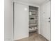 Hallway with storage shelves near the front door, great for an entry space at 520 N Stapley Dr # 253, Mesa, AZ 85203