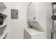 Laundry room with stacked washer and dryer for added space and convenience at 520 N Stapley Dr # 253, Mesa, AZ 85203