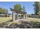 Community park featuring a pergola-covered picnic area with seating and shade at 520 N Stapley Dr # 253, Mesa, AZ 85203