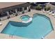 Stunning aerial view of a community pool and hot tub, perfect for relaxation and recreation at 520 N Stapley Dr # 253, Mesa, AZ 85203