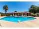 Community pool area with a hot tub and covered seating area at 520 N Stapley Dr # 253, Mesa, AZ 85203