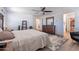 Spacious main bedroom features a ceiling fan, gray wood-look floors and plenty of storage at 5239 W Leodra Ln, Laveen, AZ 85339