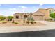 Inviting single-story home with desert landscaping, gravel yard, and attached garage at 5649 E Desert Forest Trl, Cave Creek, AZ 85331