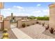 Private front courtyard with desert landscaping, a gate, and cozy seating at 5649 E Desert Forest Trl, Cave Creek, AZ 85331