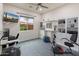 Versatile home gym with fitness equipment and built-in storage, creating a functional workout space at 5649 E Desert Forest Trl, Cave Creek, AZ 85331