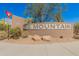 Community entrance sign with manicured landscaping and clear signage to welcome residents at 5649 E Desert Forest Trl, Cave Creek, AZ 85331