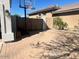 Brick patio with basketball hoop and privacy gate at 6026 E Sonoran Trl, Scottsdale, AZ 85266