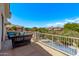 Relaxing balcony with comfortable seating and stunning views of the pool and neighborhood at 6026 E Sonoran Trl, Scottsdale, AZ 85266