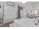Bright bedroom featuring a plush bed, closet, and ample storage with neutral tones for a relaxing atmosphere at 6026 E Sonoran Trl, Scottsdale, AZ 85266