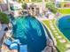 Backyard with custom pool featuring rock accents, waterfall, gazebo, and access to waterfront at 633 W Aster Ct, Chandler, AZ 85248