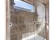 Tiled shower with a window that lets in natural light at 633 W Aster Ct, Chandler, AZ 85248