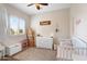 Charming room featuring natural light, soft colors, and playful decor at 633 W Aster Ct, Chandler, AZ 85248