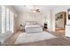 Inviting bedroom boasts a ceiling fan, a fireplace, and a soaking tub for ultimate relaxation at 633 W Aster Ct, Chandler, AZ 85248