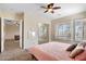 Spacious bedroom with ensuite and carpet. Shutter style window coverings included at 633 W Aster Ct, Chandler, AZ 85248