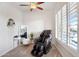 Relaxing bedroom features a massage chair, a vanity and plantation shutters, ideal for unwinding at 633 W Aster Ct, Chandler, AZ 85248