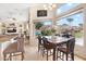 Inviting dining area with lake views and seamless transition to the outdoor living space at 633 W Aster Ct, Chandler, AZ 85248
