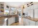 Modern kitchen with a breakfast bar, stainless steel appliances and scenic views at 633 W Aster Ct, Chandler, AZ 85248